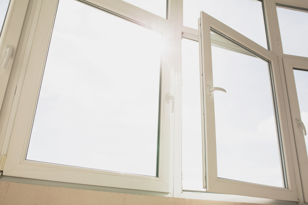 Closeup,shot,of,plastic,window,witn,sun,light,at,sunrise